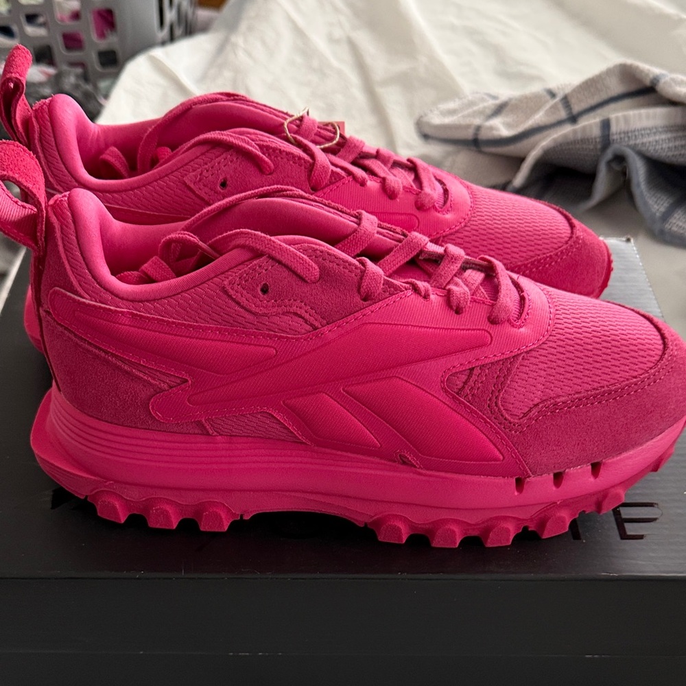 Cardi B for Reebok hot pink sneakers